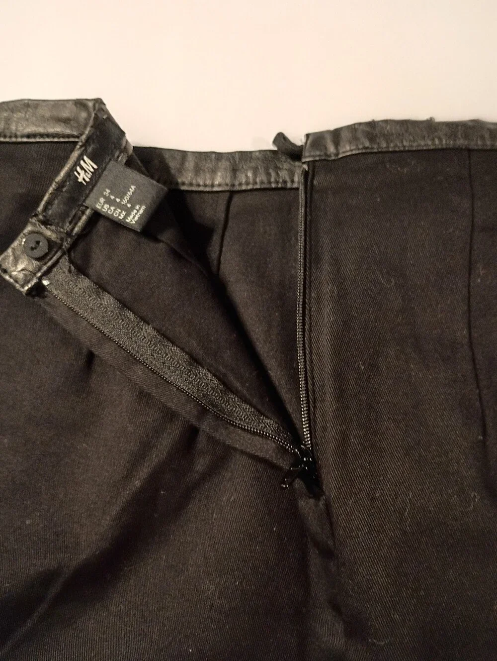 H&M Size 4 Black Mini Skirt Zipper & Button Close Faux Leather Accent